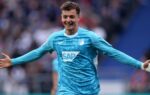 Fisnik Asllani avec Hoffenheim lors d’un match, cible potentielle du FC Barcelone.