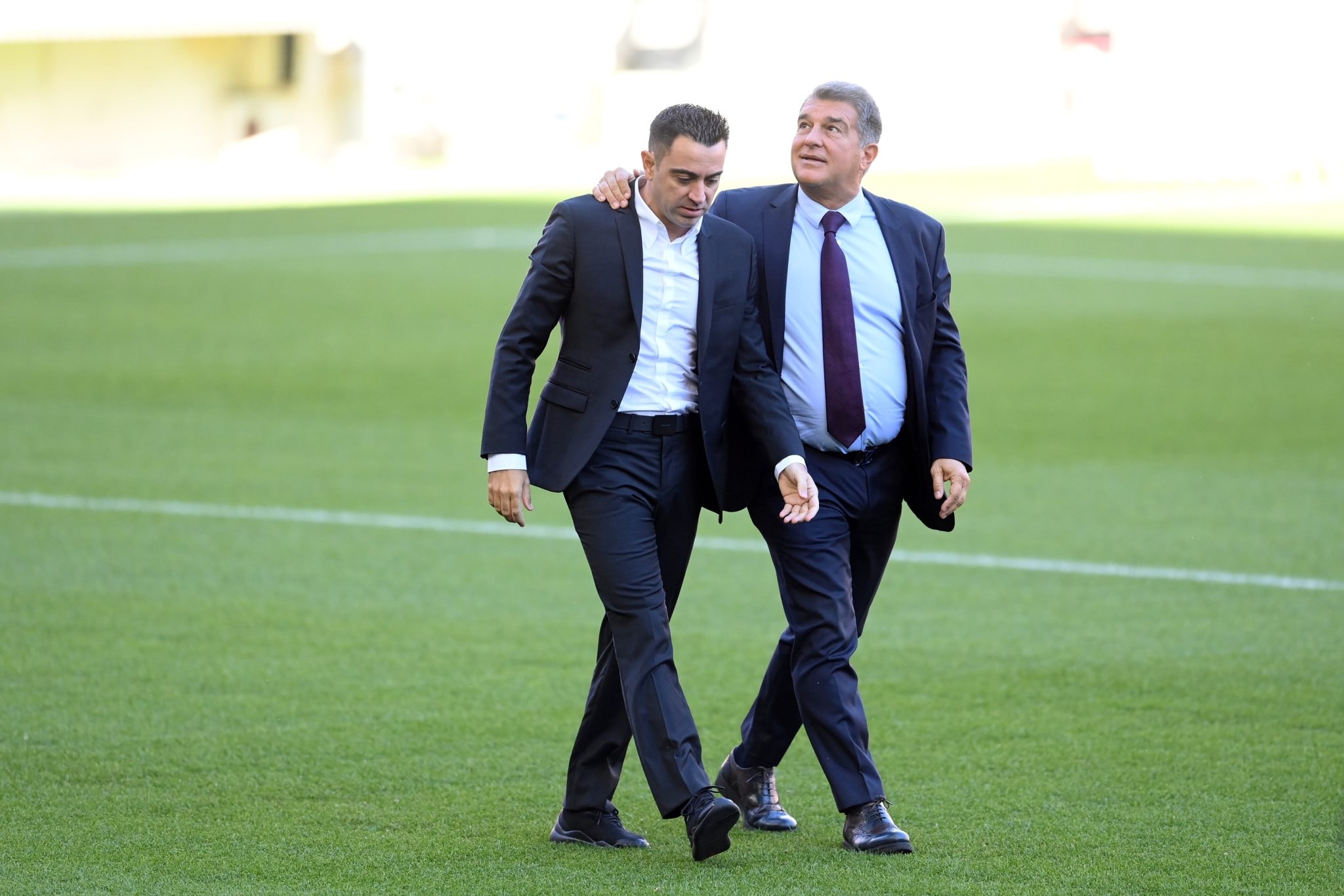 Xavi Hernández et Joan Laporta du Barça