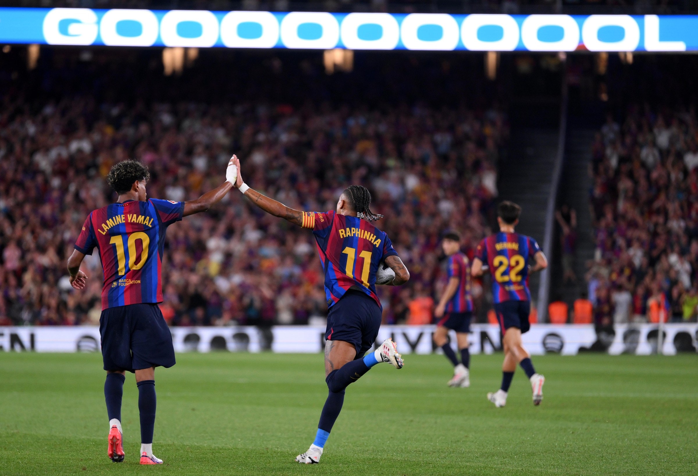 BARCELONA, SPAIN - AUGUST 31: Raphinha of Barcelona celebrates scoring his team’s first goal with teammate Lamine Yamal during the LaLiga EA Sports 2026/27 match between FC Barcelona and Rayo Vallecano de Madrid at Spotify Camp Nou on August 31, 2026 in Barcelona, Spain. (Photo by David Ramos/Getty Images)