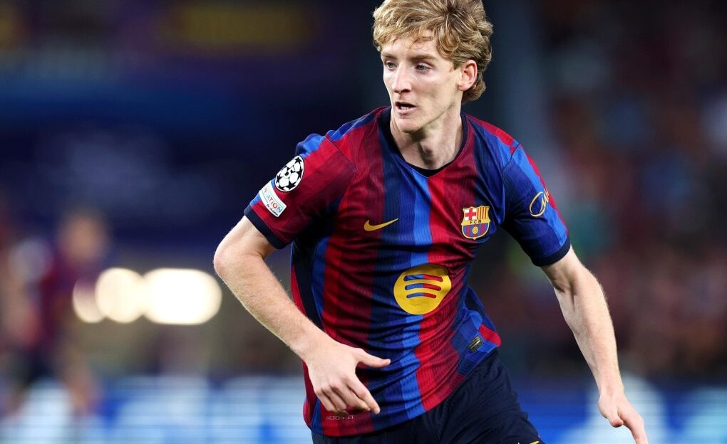 Les joueurs du Barça réunis sur la pelouse pendant un match au Camp Nou.