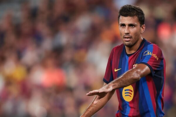 Des joueurs du Barça sur la pelouse pendant un match de Liga.