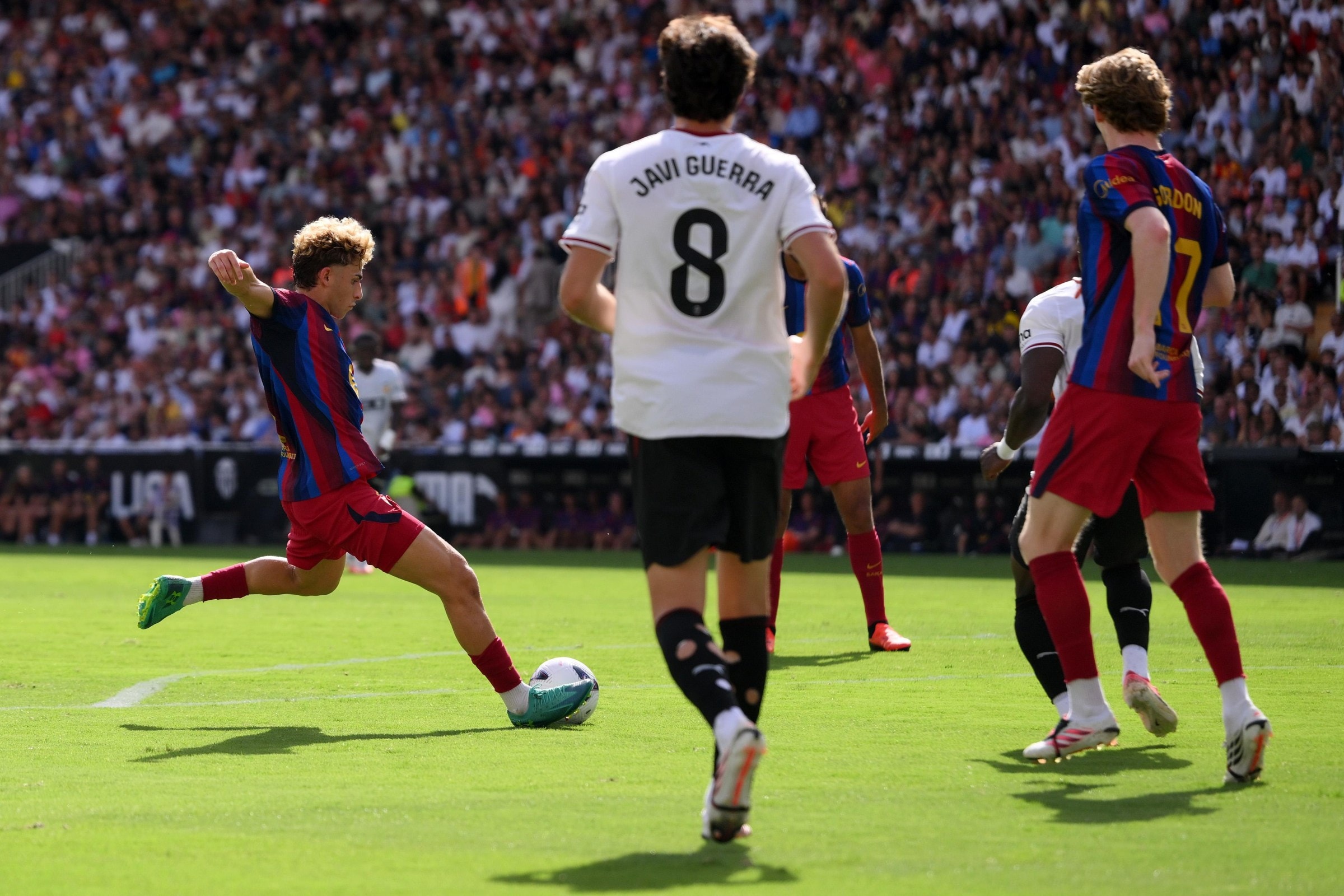 VALENCIA, SPAIN - SEPTEMBER 06: Fermin Lopez of Barcelona scores his team’s second goal during the LaLiga EA Sports 2026/27 match between Valencia CF and FC Barcelona at Estadi de Mestalla on September 06, 2026 in Valencia, Spain. (Photo by David Ramos/Getty Images)
