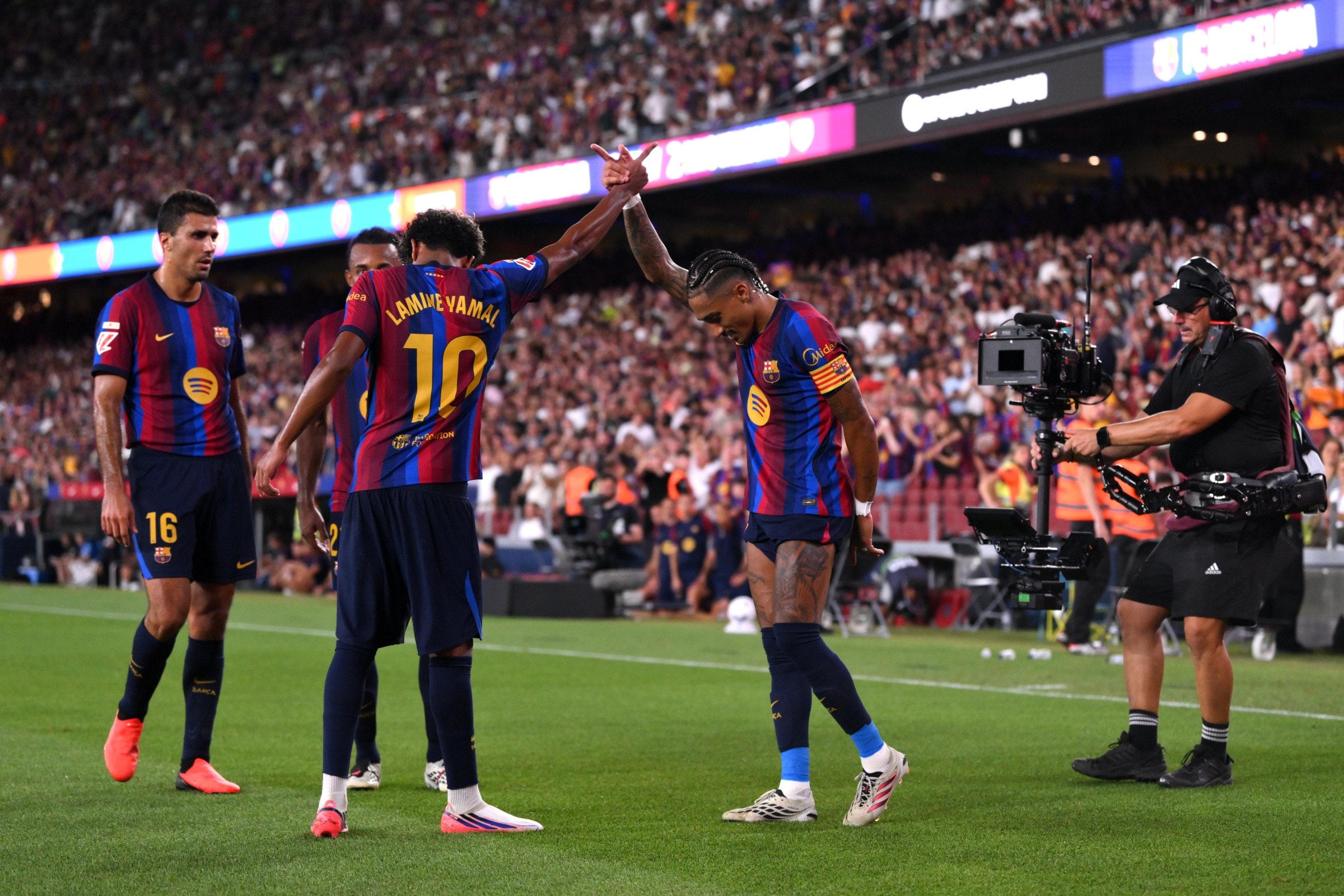 BARCELONA, SPAIN - AUGUST 31: Raphinha of Barcelona celebrates scoring his team’s fourth goal with teammate Lamine Yamal during the LaLiga EA Sports 2026/27 match between FC Barcelona and Rayo Vallecano de Madrid at Spotify Camp Nou on August 31, 2026 in Barcelona, Spain. (Photo by David Ramos/Getty Images)