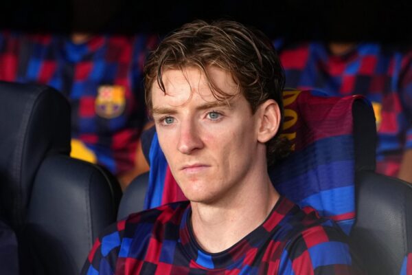 Des joueurs du Barça sur le banc pendant un match.